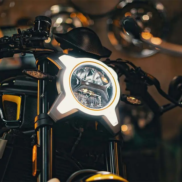 SELF-ADJUSTING HEADLIGHT